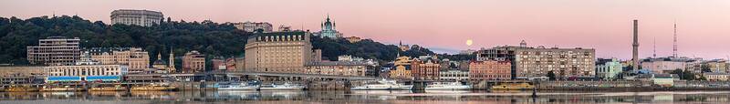 Kyiv view with various cultural heritage monuments: St. Andrew's Church, Kyiv River Terminal